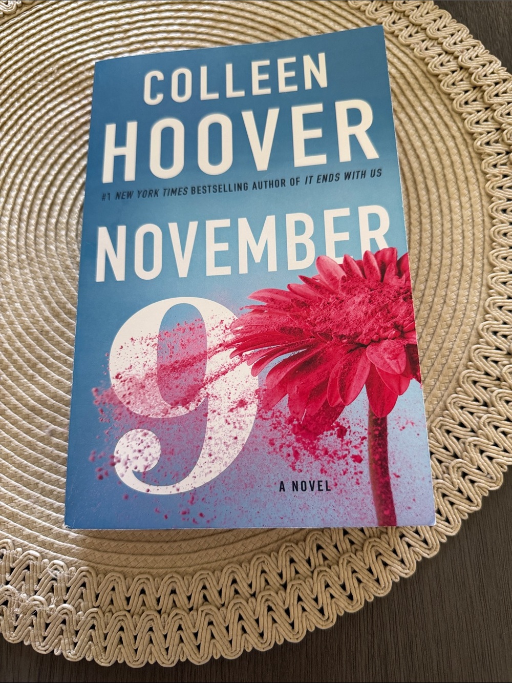 November 9 Paperback Novel - Blue Cover with Pink Flower